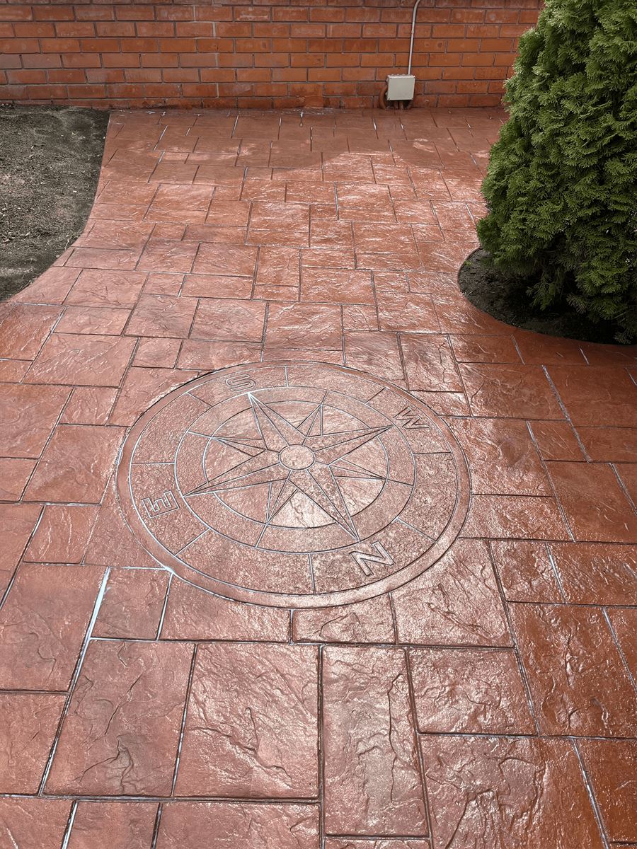 detalle rosa de los vientos hormigon impreso jardin ranxos bonany